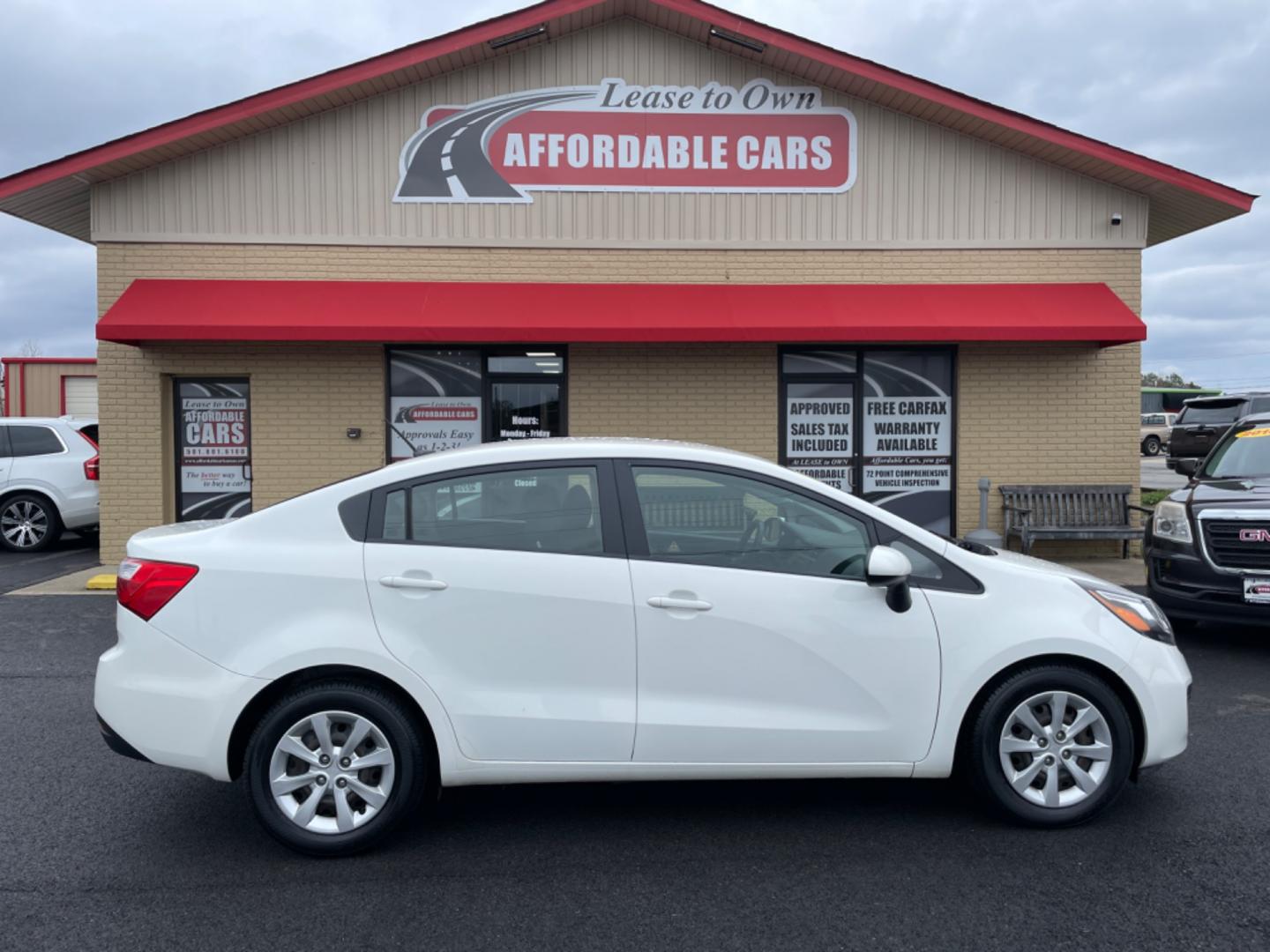 2014 White Kia Rio (KNADN4A35E6) with an 4-Cyl, 1.6 Liter engine, Automatic, 6-Spd transmission, located at 8008 Warden Rd, Sherwood, AR, 72120, (501) 801-6100, 34.830078, -92.186684 - Photo#0